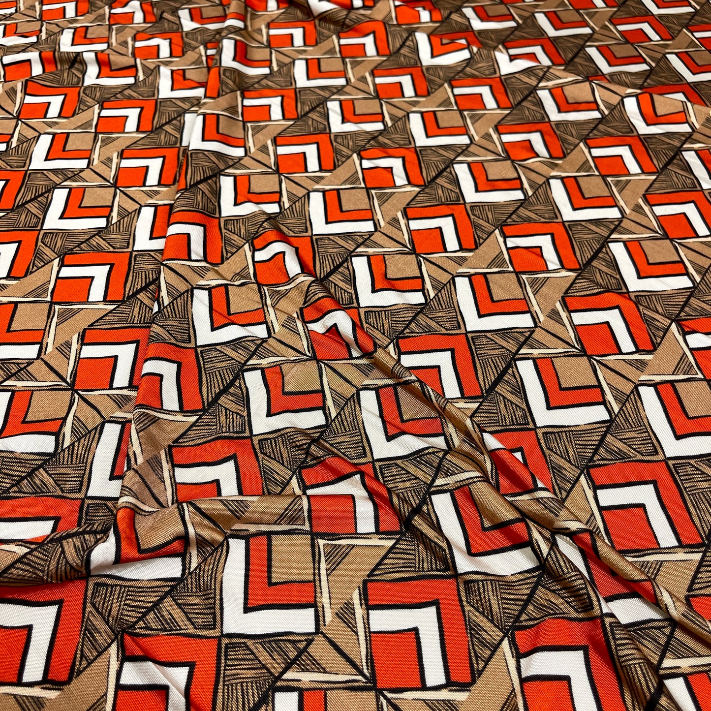 Jersey di Viscosa Fantasia Geometrica Arancio e Beige