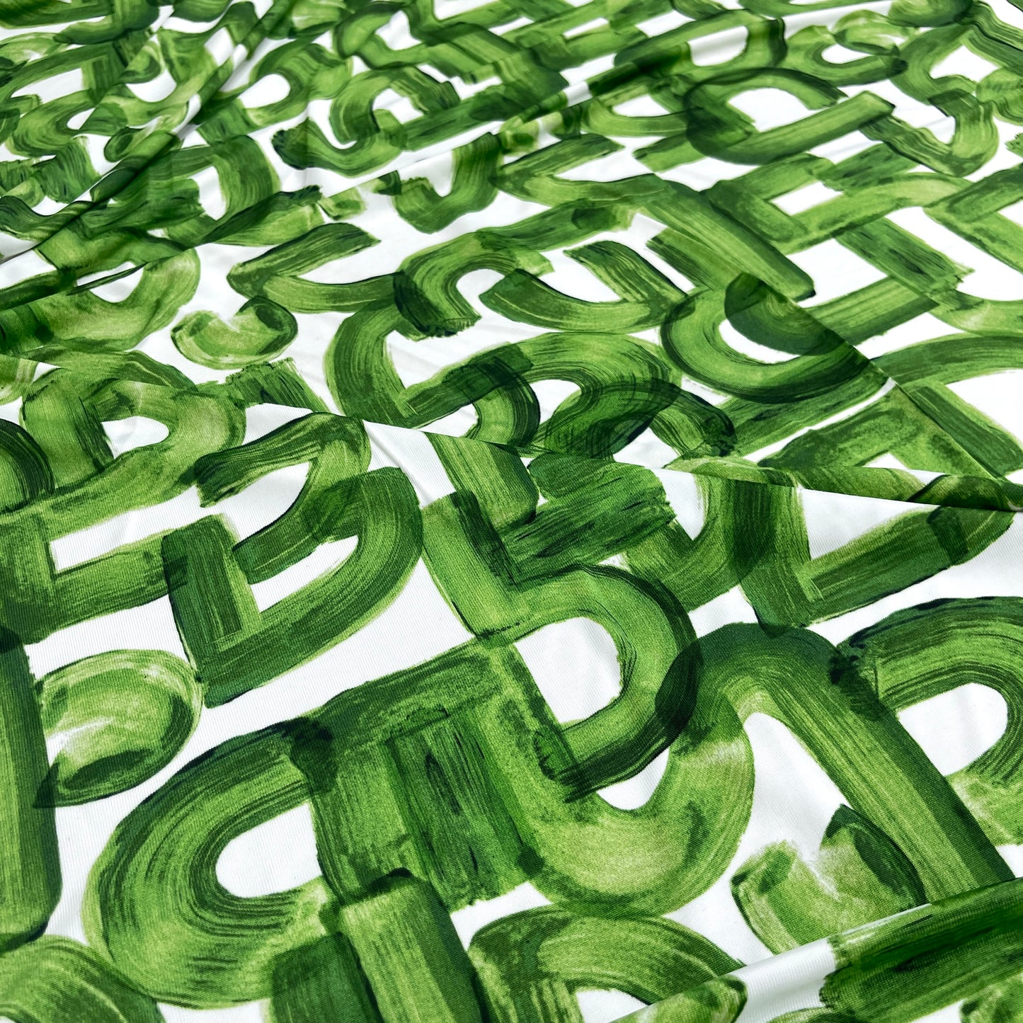 Jersey di Viscosa Fantasia Geometrica Pennellata Verde