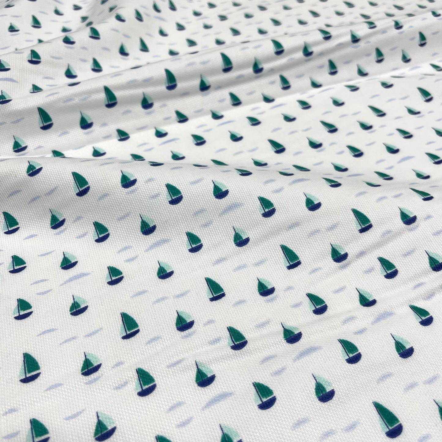 Piqué di Cotone – Fantasia Barchette Verde