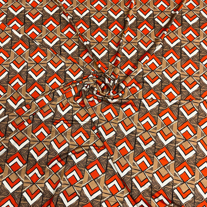 Jersey di Viscosa Fantasia Geometrica Arancio e Beige