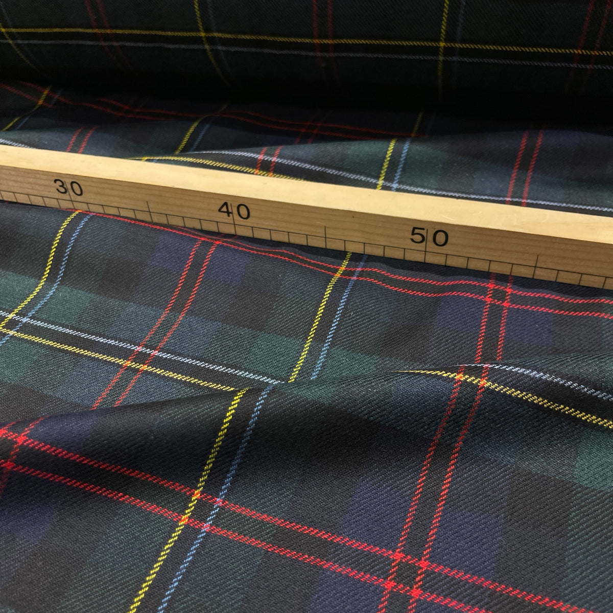 Misto lana tartan verde e blu con righe rosse gialle e azzurre