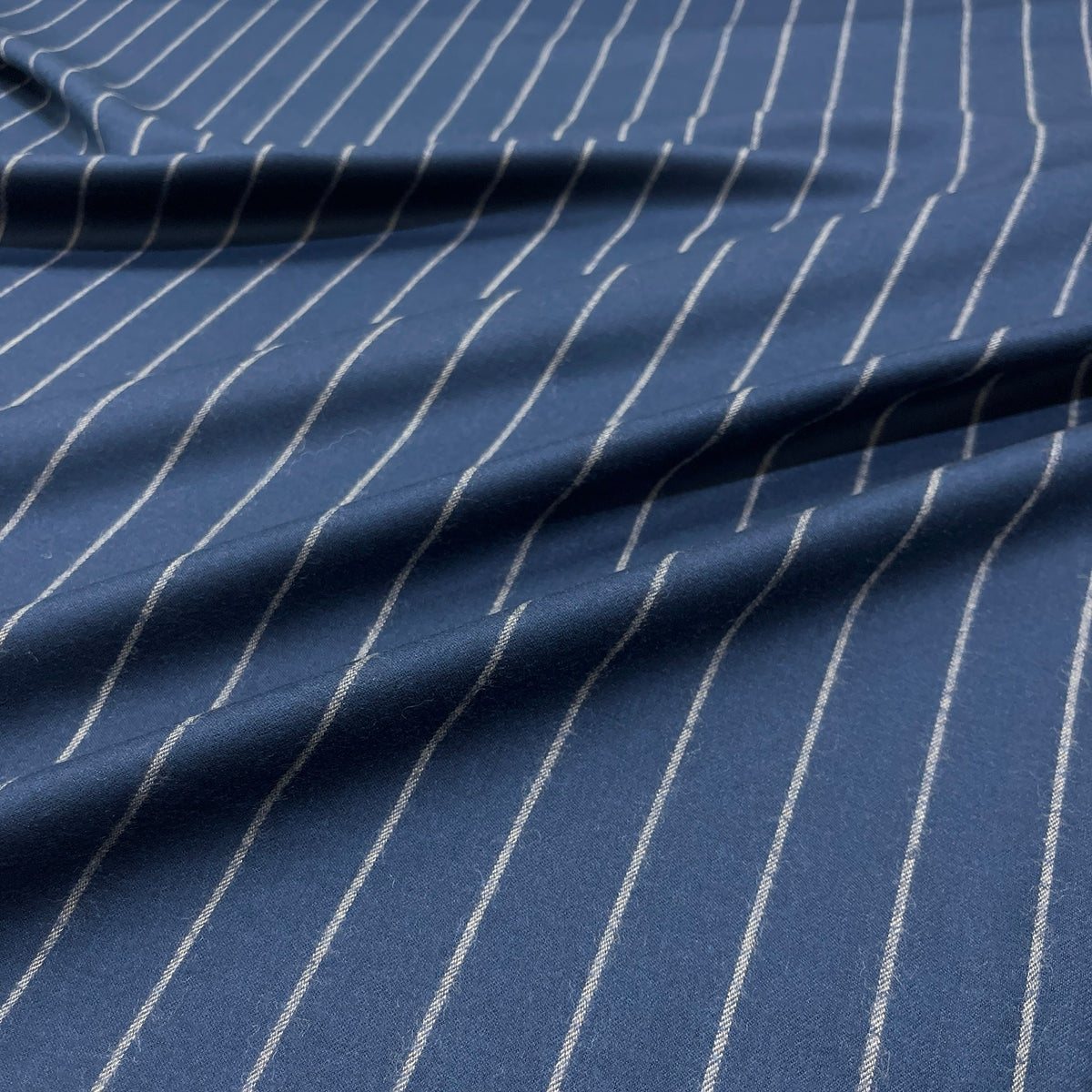 Flanella di lana elasticizzata gessata blu