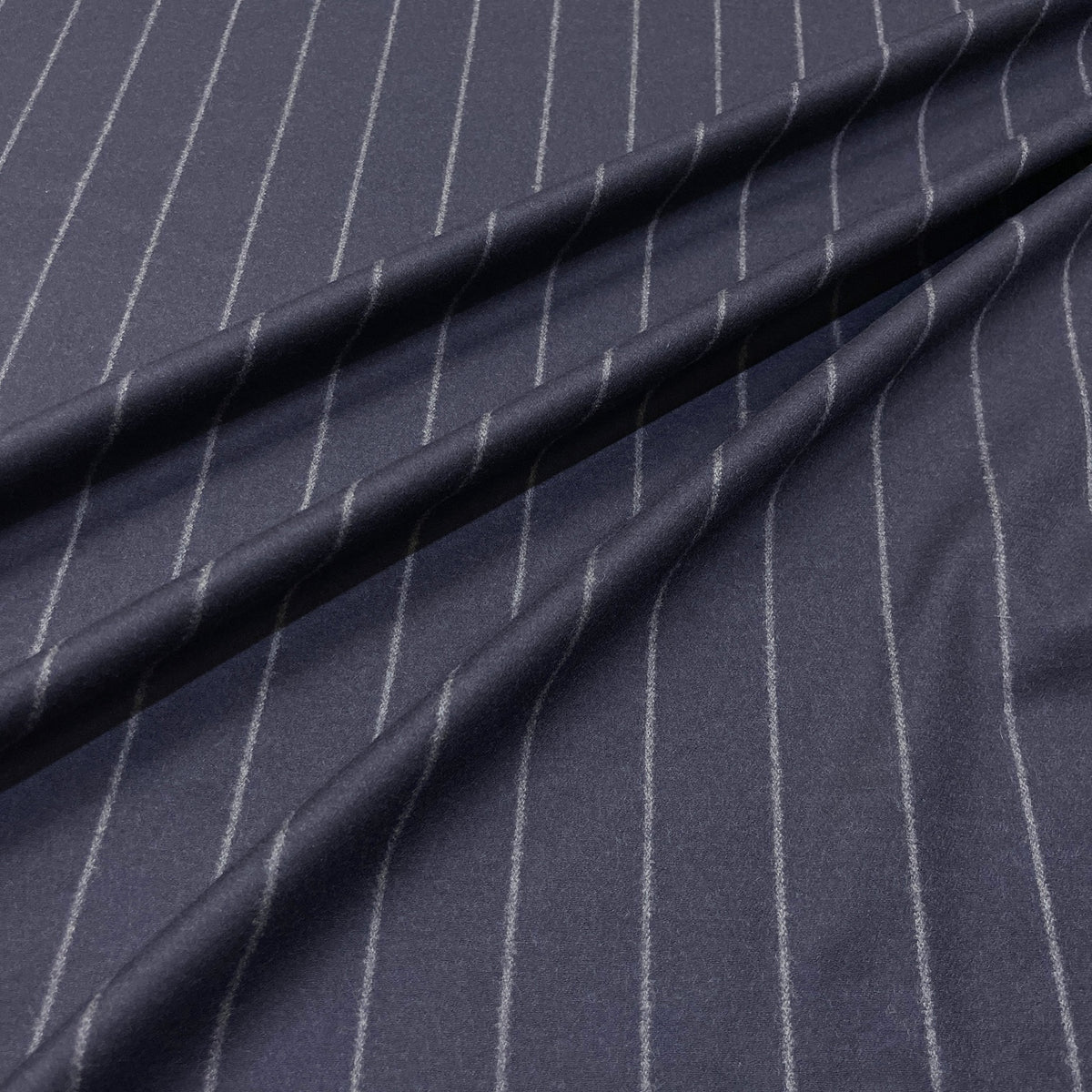 Flanella di lana elasticizzata gessata blu