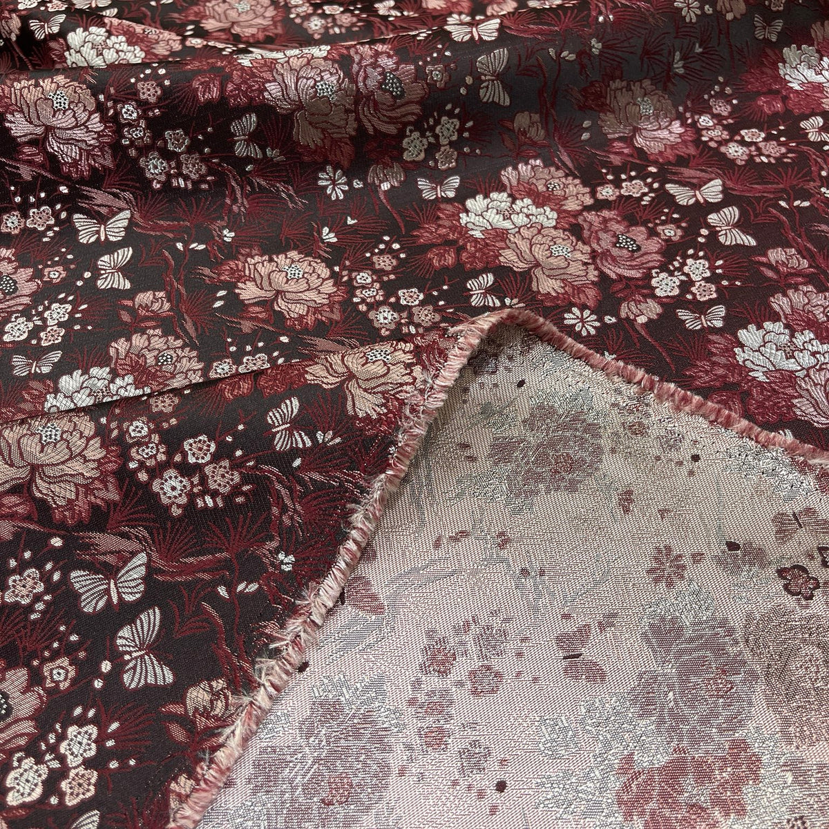 Rovescio jacquard floreale in poliestere