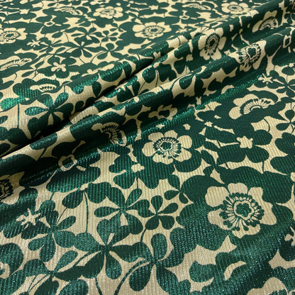 Dettaglio jacquard floreale verde e oro