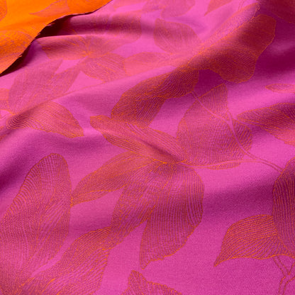 Jacquard in poliestere doppio floreale - lato fucsia