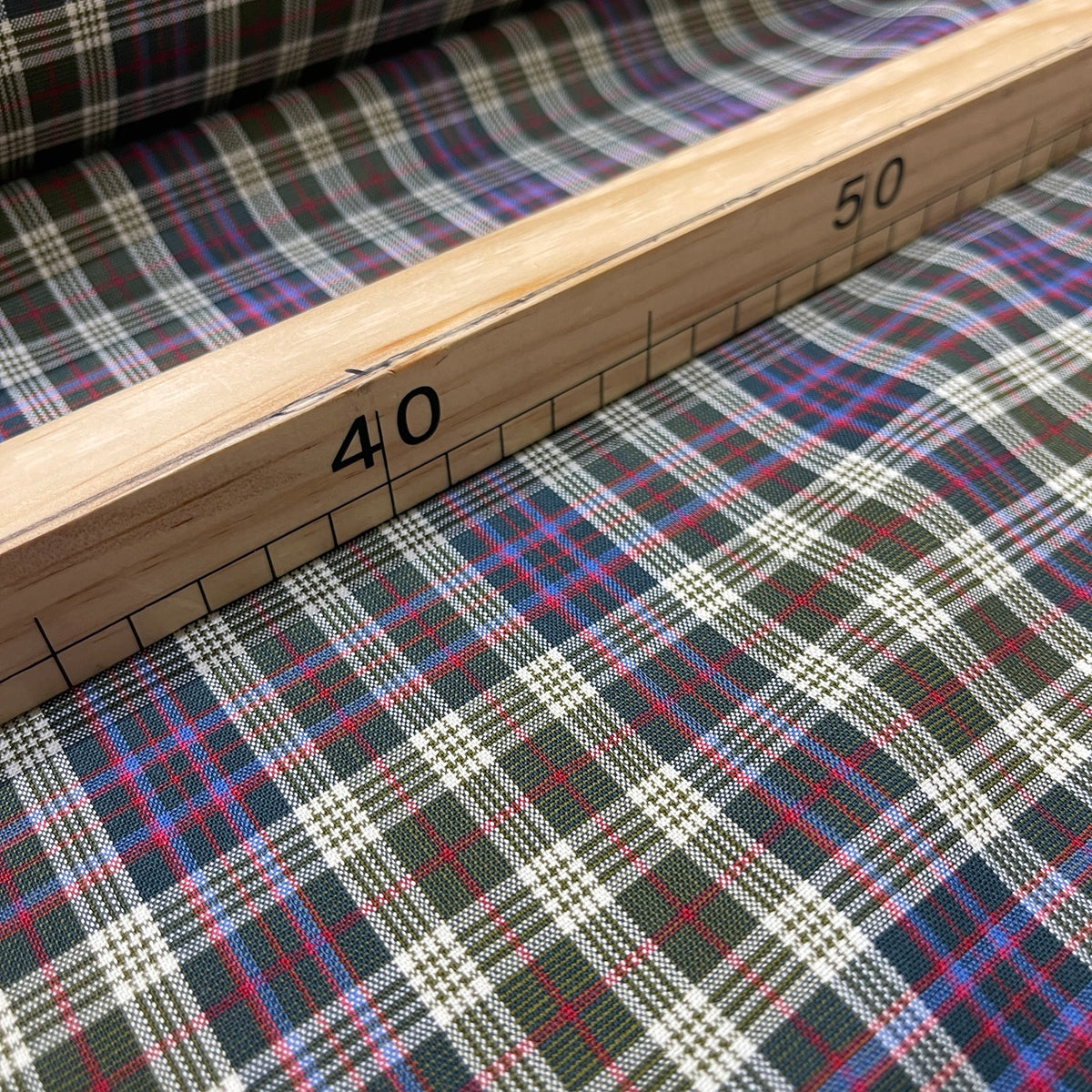 Lana vergine elasticizzata tartan verde, blu, rosso e panna