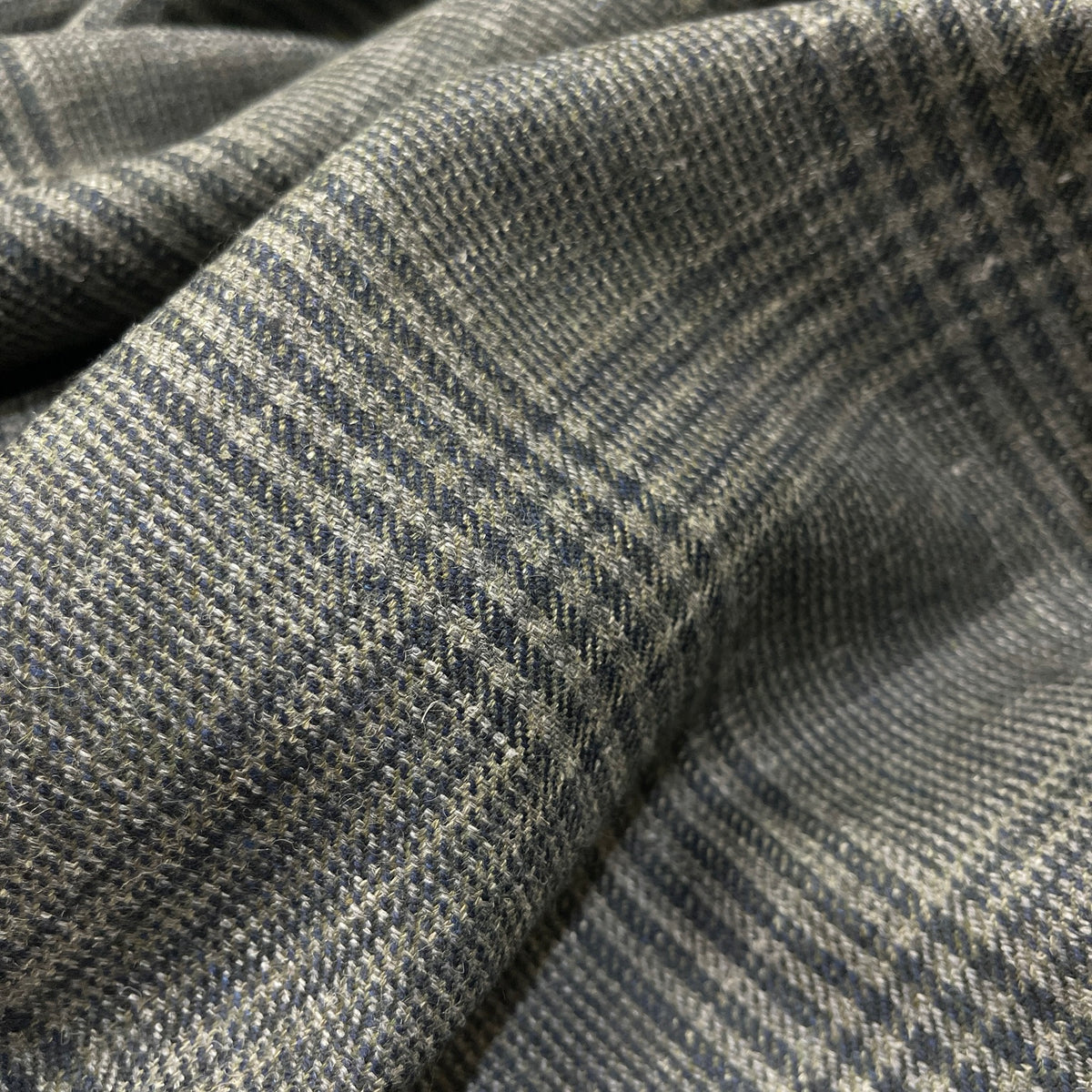 Pura lana vergine Principe di Galles verde con check blu notte