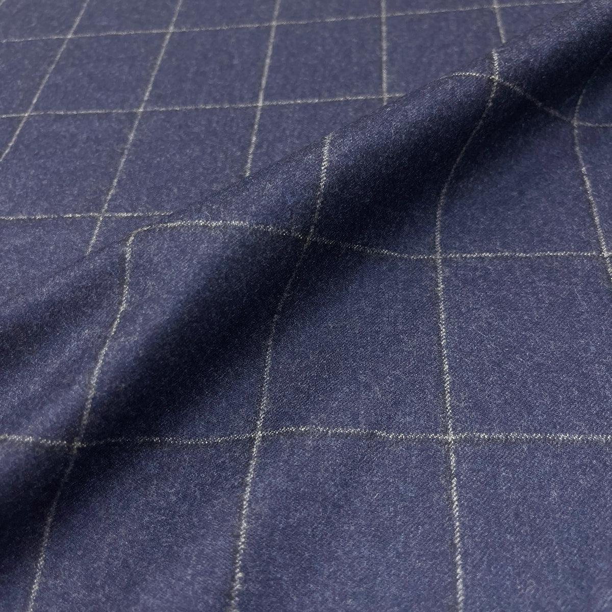 Flanella in pura lana Super 120’s con check blu navy e grigio