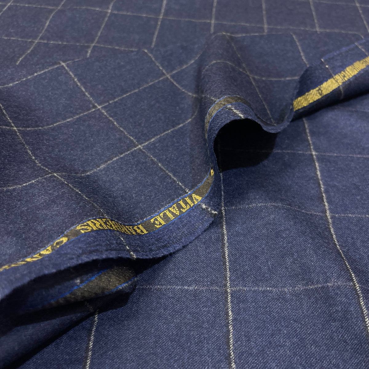 Flanella in pura lana Super 120’s con check blu navy e grigio