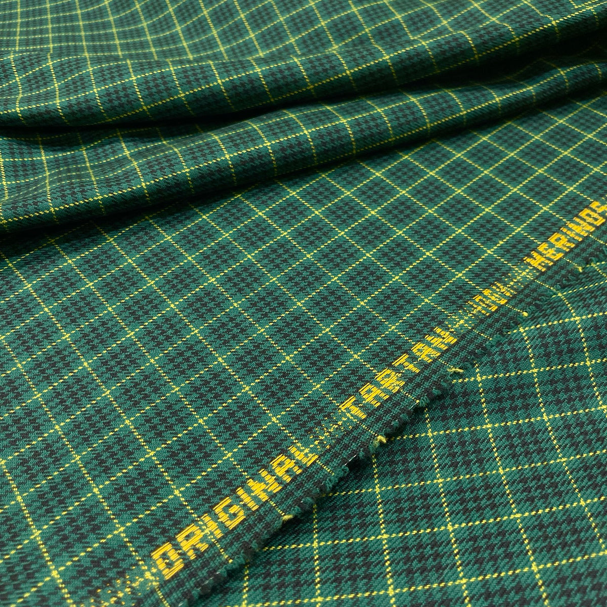 Tartan in pura lana verde con quadri scuri e righe gialle