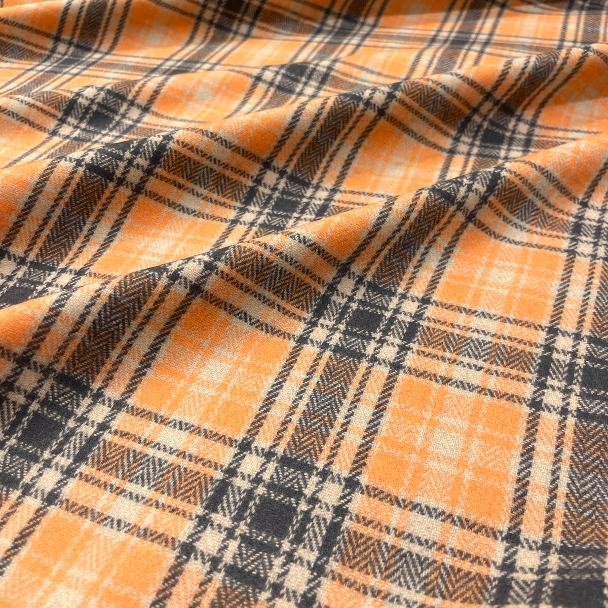 Dettaglio della mano della pura lana tartan