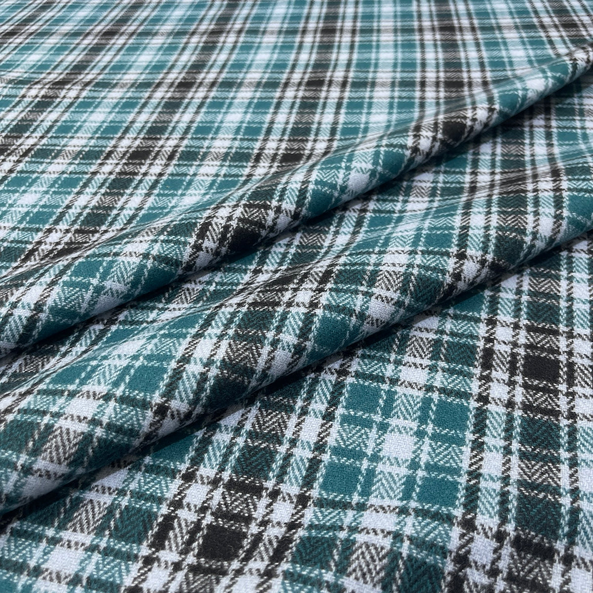 Dettaglio della pura lana tartan verde petrolio